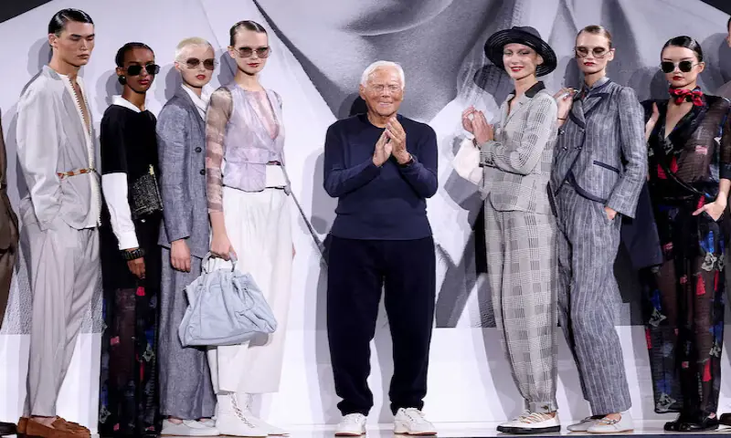 Designer Giorgio Armani stands next to models during the Emporio Armani Spring/Summer 2025 collection at the Fashion Week in Milan, Italy. – Reuters file Designer Giorgio Armani stands next to models during the Emporio Armani Spring/Summer 2025 collection at the Fashion Week in Milan, Italy. – Reuters file