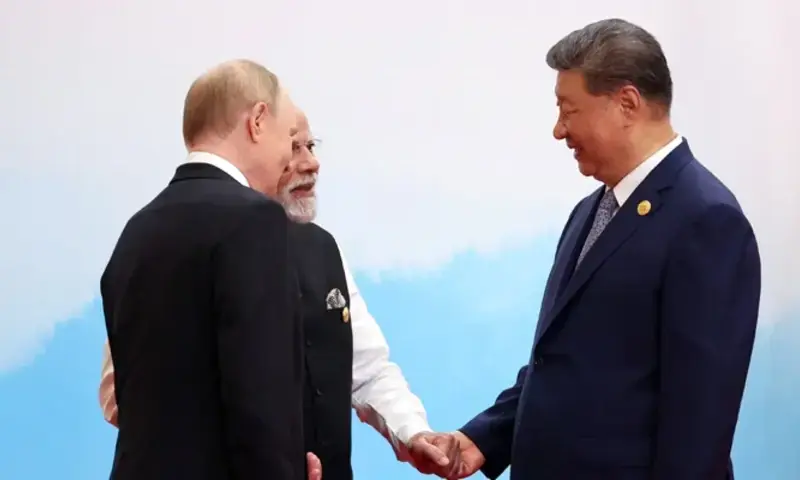 Chinese President Xi Jinping, Indian Prime Minister Narendra Modi and Russian President Vladimir Putin speak during a meeting at the Shanghai Cooperation Organisation (SCO) summit in Tianjin, China, September 1. Photo via Reuters Chinese President Xi Jinping, Indian Prime Minister Narendra Modi and Russian President Vladimir Putin speak during a meeting at the Shanghai Cooperation Organisation (SCO) summit in Tianjin, China, September 1. Photo via Reuters