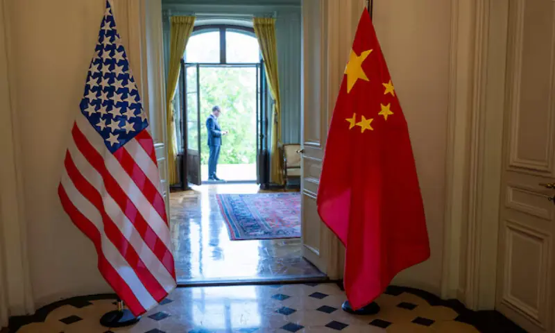 The US and Chinese flags are seen on the day of a bilateral meeting between the US and China, in Geneva, Switzerland, on May 10, 2025. – Reuters file The US and Chinese flags are seen on the day of a bilateral meeting between the US and China, in Geneva, Switzerland, on May 10, 2025. – Reuters file