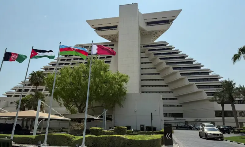 Flags of Afghanistan, Jordan, Azerbaijan and Qatar flutter as Qatar prepares to host the Emergency Arab-Islamic Summit at the Sheraton Hotel, in Doha, Qatar, September 14, 2025. REUTERS