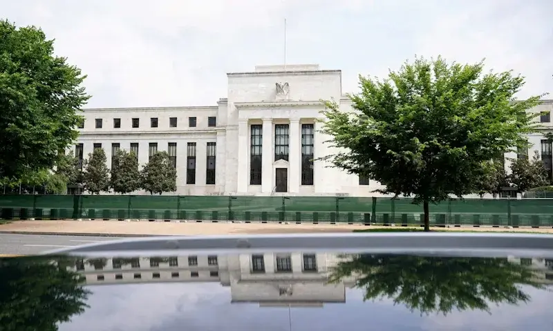 FILE PHOTO: The Federal Reserve Board Building in Washington, June 14, 2022. REUTERS FILE PHOTO: The Federal Reserve Board Building in Washington, June 14, 2022. REUTERS