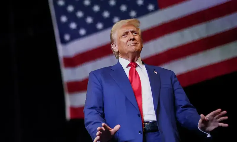 Republican presidential nominee and former U.S. President Donald Trump gestures during a rally in Novi, Michigan, U.S. October 26, 2024. REUTERS