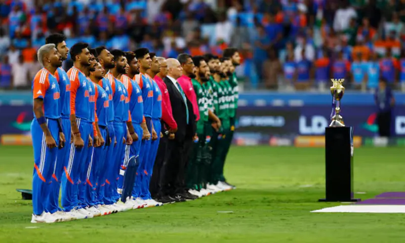Pakistani and Indian players line up for national anthems. – Reuters file