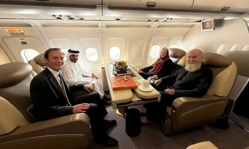 British citizens named Peter and Barbara Reynolds, who had been in custody in Afghanistan, sit with Qatari and British diplomats, on an aircraft, in the air, September 19, 2025. Qatar Government/Handout via REUTERS British citizens named Peter and Barbara Reynolds, who had been in custody in Afghanistan, sit with Qatari and British diplomats, on an aircraft, in the air, September 19, 2025. Qatar Government/Handout via REUTERS