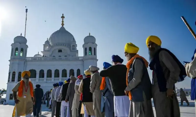 Caption: Sikh Pilgrims stand in a queue to visit the Shrine of Baba Guru Nanak Dev at Gurdwara Darbar Sahib in Kartarpur, on November 9, 2019. Photo via AFP Caption: Sikh Pilgrims stand in a queue to visit the Shrine of Baba Guru Nanak Dev at Gurdwara Darbar Sahib in Kartarpur, on November 9, 2019. Photo via AFP