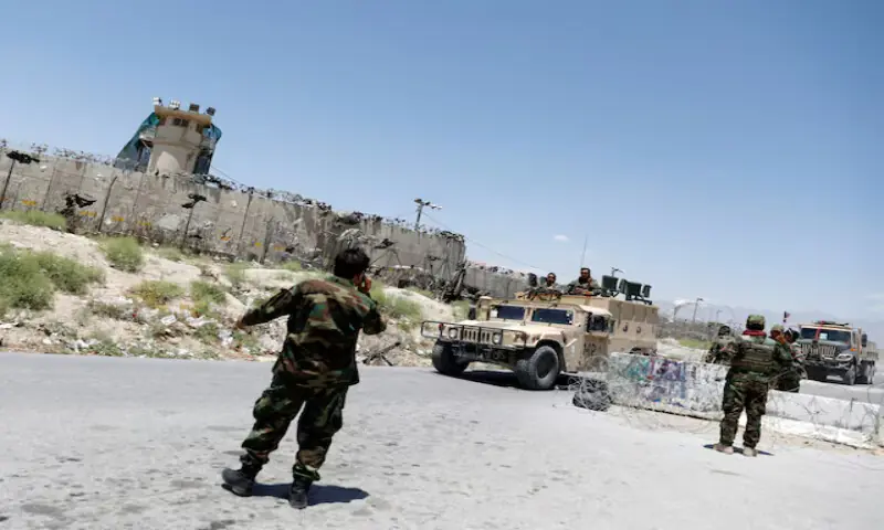 Afghan soldiers stand guard at a checkpoint outside the US Bagram air base, on the day the last of American troops vacated it, Parwan province, Afghanistan. – Reuters file Afghan soldiers stand guard at a checkpoint outside the US Bagram air base, on the day the last of American troops vacated it, Parwan province, Afghanistan. – Reuters file
