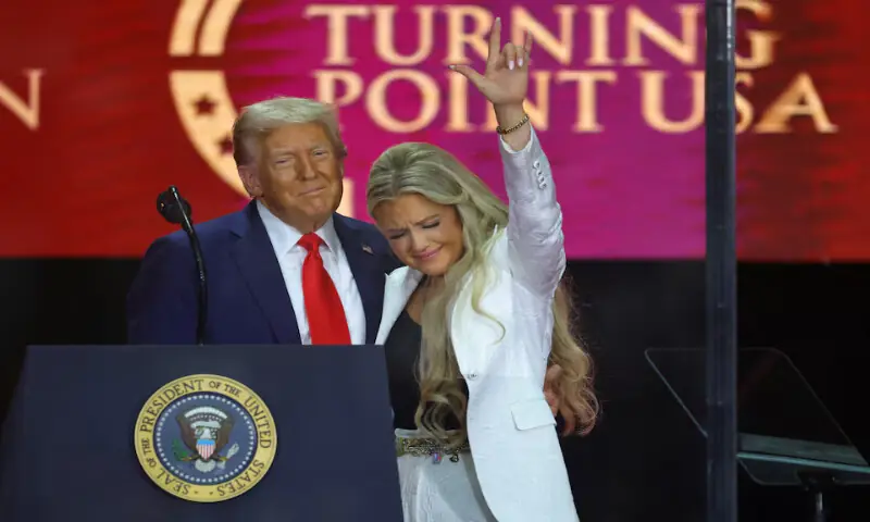 US President Donald Trump embraces Erika Kirk as she gestures during a memorial service for her husband Charlie Kirk at State Farm Stadium in Arizona, US. m– Reuters US President Donald Trump embraces Erika Kirk as she gestures during a memorial service for her husband Charlie Kirk at State Farm Stadium in Arizona, US. m– Reuters