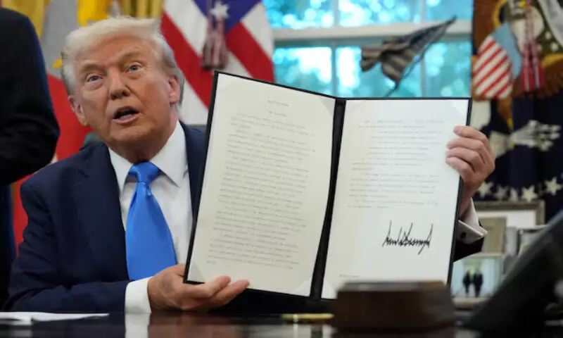 US President Donald Trump displays a signed executive order on gold card visa in the Oval Office at the White House in Washington, DC. – Reuters file US President Donald Trump displays a signed executive order on gold card visa in the Oval Office at the White House in Washington, DC. – Reuters file
