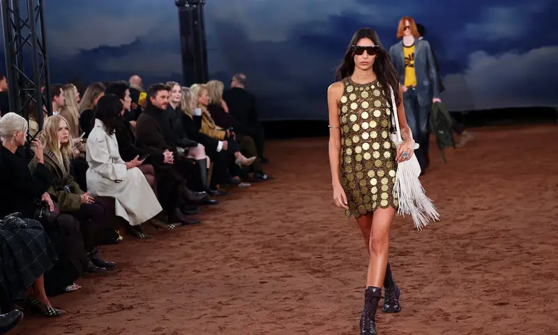 Models present creations at the Burberry catwalk show held during London Fashion Week in London, Britain, September 22, 2025. REUTERS Models present creations at the Burberry catwalk show held during London Fashion Week in London, Britain, September 22, 2025. REUTERS