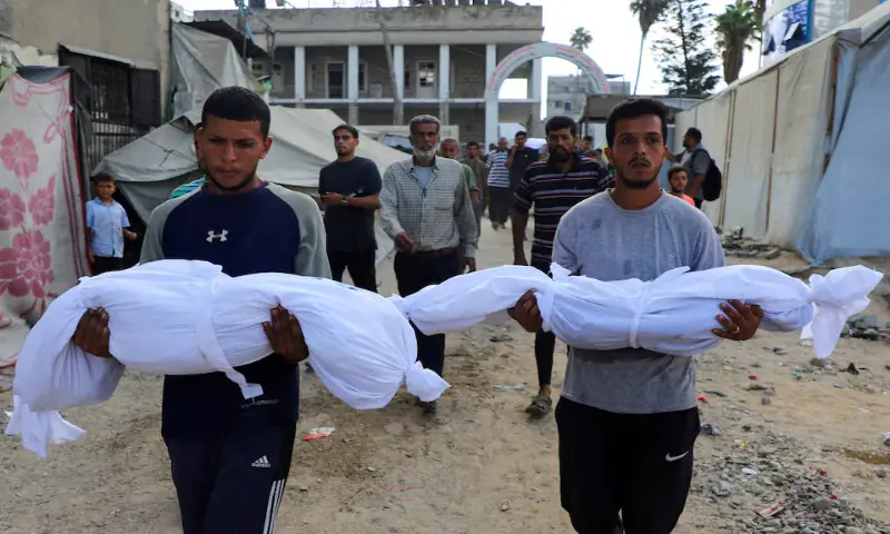 Mourners carry the bodies of Palestinian children, who were killed in an Israeli strike at Al-Ahli Arab Hospital in Gaza City. – Reuters Mourners carry the bodies of Palestinian children, who were killed in an Israeli strike at Al-Ahli Arab Hospital in Gaza City. – Reuters