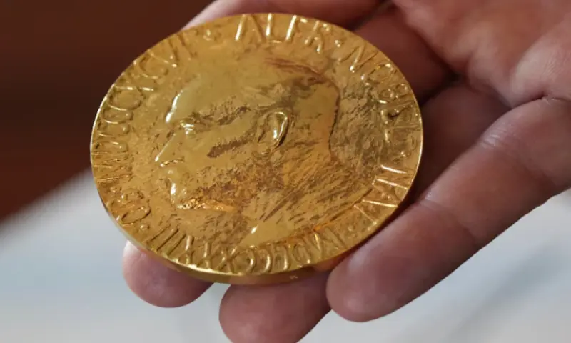 An employee of the Norwegian Nobel Institute holds a replica of a Nobel Peace Medal in the Institute in Oslo, Norway, on September 9, 2025. Reuters An employee of the Norwegian Nobel Institute holds a replica of a Nobel Peace Medal in the Institute in Oslo, Norway, on September 9, 2025. Reuters