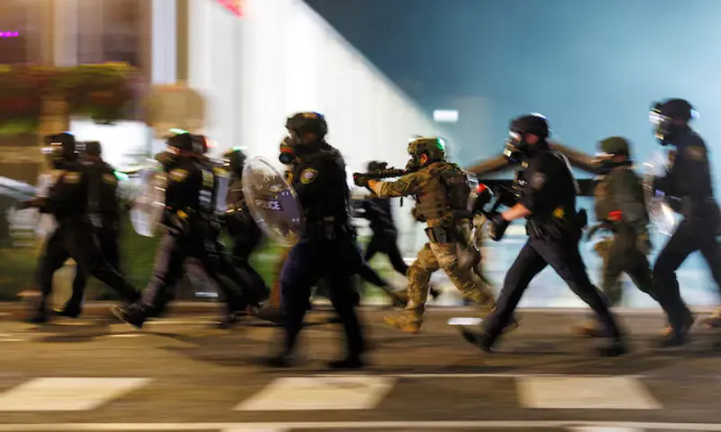 ICE agents charge towards protesters during a protest against the US President Donald Trump administration’s immigration policies, outside an ICE detention facility in Portland, Oregon. – Reuters file ICE agents charge towards protesters during a protest against the US President Donald Trump administration’s immigration policies, outside an ICE detention facility in Portland, Oregon. – Reuters file