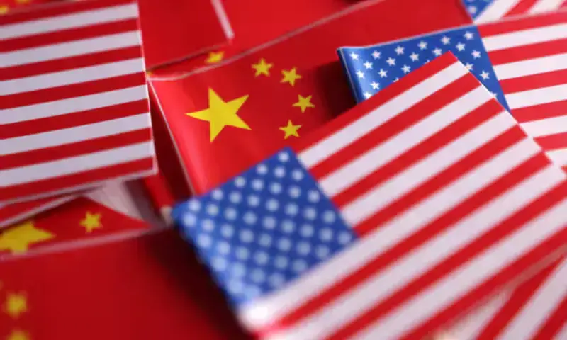 U.S. and Chinese flags are seen in this illustration created on March 20. REUTERS U.S. and Chinese flags are seen in this illustration created on March 20. REUTERS