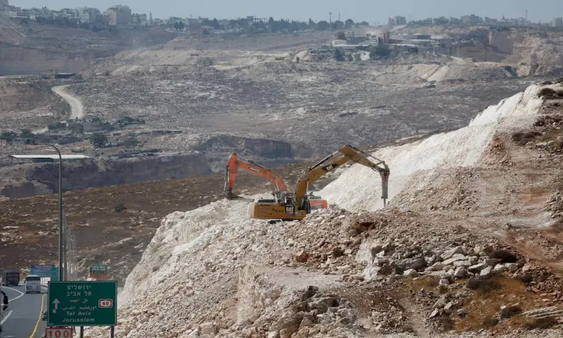 Excavators expand an Israeli bypass road connecting Israeli settlers in the West Bank with Jerusalem near Ramallah in the Israeli-occupied West Bank. – Reuters Excavators expand an Israeli bypass road connecting Israeli settlers in the West Bank with Jerusalem near Ramallah in the Israeli-occupied West Bank. – Reuters