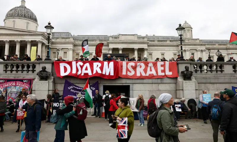 People attend a mass demonstration against the British government’s ban on Palestine Action group at Trafalgar Square, in London. – Reuters People attend a mass demonstration against the British government’s ban on Palestine Action group at Trafalgar Square, in London. – Reuters