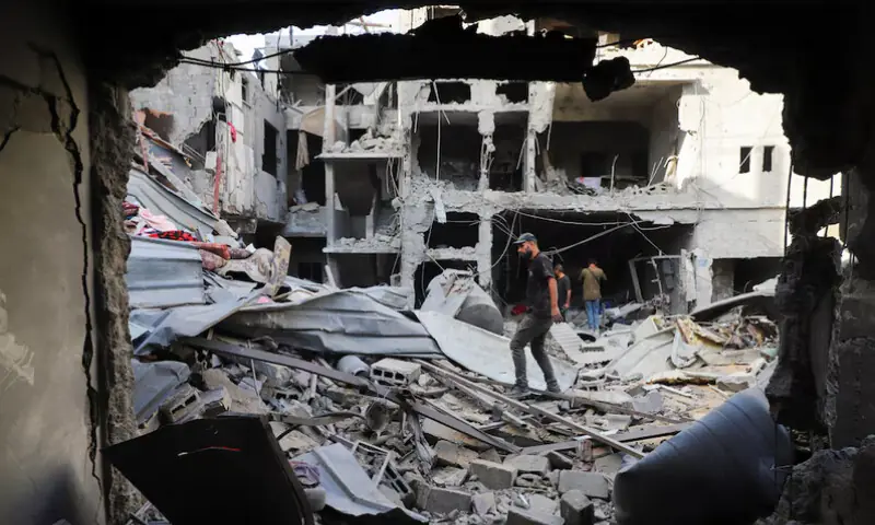 Palestinians inspect the site of an Israeli strike on Saturday, on a house in the Tuffah neighborhood in Gaza City October 5, 2025. REUTERS Palestinians inspect the site of an Israeli strike on Saturday, on a house in the Tuffah neighborhood in Gaza City October 5, 2025. REUTERS