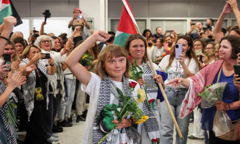Swedish activist Greta Thunberg, who was part of the Global Sumud Flotilla seeking to deliver aid to Gaza and was detained by Israel, gestures as she is greeted by supporters upon her arrival to the Athens Eleftherios Venizelos International Airport, in Athens, on October 6, 2025. Reuters Swedish activist Greta Thunberg, who was part of the Global Sumud Flotilla seeking to deliver aid to Gaza and was detained by Israel, gestures as she is greeted by supporters upon her arrival to the Athens Eleftherios Venizelos International Airport, in Athens, on October 6, 2025. Reuters
