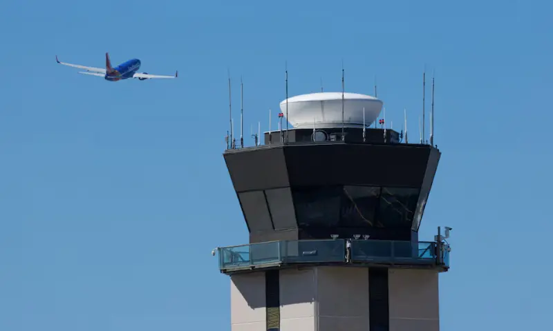 A commercial airliner takes off past the air traffic control tower at San Diego International Airport during the first day of a partial US government shutdown in San Diego, California. – Reuters A commercial airliner takes off past the air traffic control tower at San Diego International Airport during the first day of a partial US government shutdown in San Diego, California. – Reuters