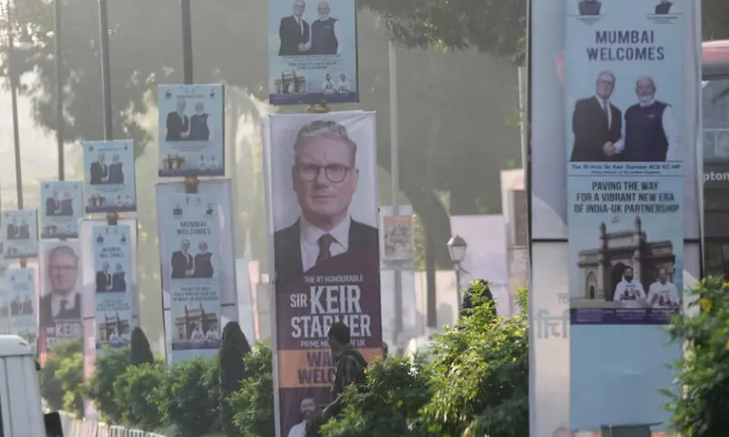 Posters welcoming British Prime Minister Keir Starmer line a street in Mumbai during his visit to India, in Mumbai, India, October 8, 2025. Stefan Rousseau/Pool via REUTERS Posters welcoming British Prime Minister Keir Starmer line a street in Mumbai during his visit to India, in Mumbai, India, October 8, 2025. Stefan Rousseau/Pool via REUTERS