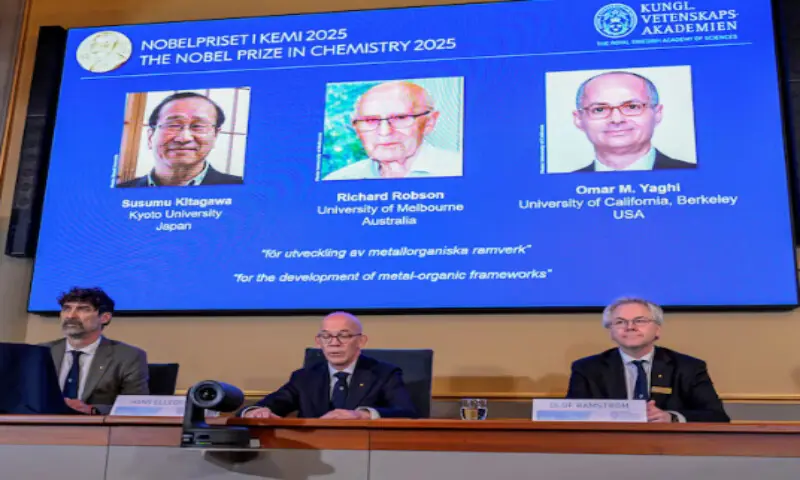 A screen displays the 2025 Nobel Prize laureates in Chemistry, Susumu Kitagawa, Richard Robson, and Omar M. Yaghi, as they are announced during a press conference at the Royal Swedish Academy of Sciences in Stockholm, Sweden, on Wednesday. – Reuters A screen displays the 2025 Nobel Prize laureates in Chemistry, Susumu Kitagawa, Richard Robson, and Omar M. Yaghi, as they are announced during a press conference at the Royal Swedish Academy of Sciences in Stockholm, Sweden, on Wednesday. – Reuters