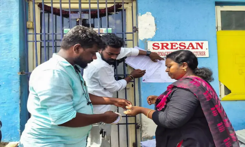 A health official sticks a notice outside the Sresan Pharmaceutical factory whose Coldrif cough syrup has been linked to the deaths of 17 children in Madhya Pradesh, in Chennai, India. – Reuters