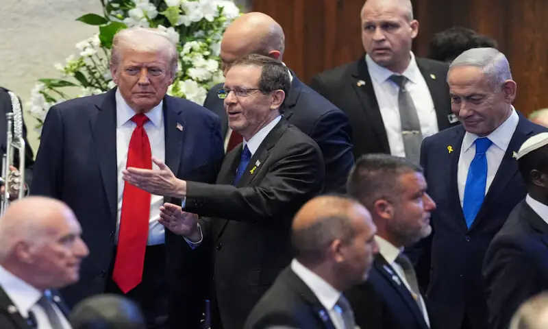 US President Donald Trump enters the Knesset with Israel’s President Isaac Herzog and Prime Minister Benjamin Netanyahu on Monday in Jerusalem. – Reuters US President Donald Trump enters the Knesset with Israel’s President Isaac Herzog and Prime Minister Benjamin Netanyahu on Monday in Jerusalem. – Reuters