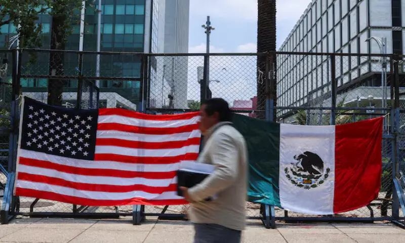 A person passes by Mexican and US flags placed outside the US Embassy in Mexico City, Mexico. – Reuters file A person passes by Mexican and US flags placed outside the US Embassy in Mexico City, Mexico. – Reuters file