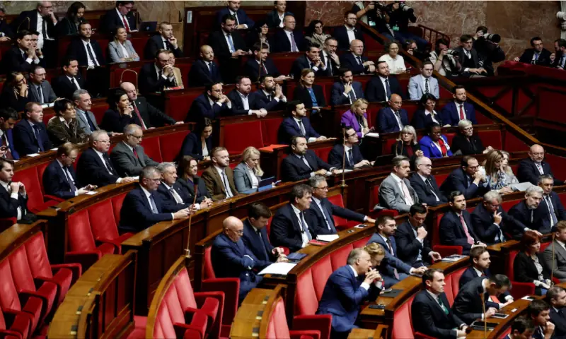 [1/6] Members of parliament of French far-right National Rally (Rassemblement National - RN) party parliamentary group, and the Union des Droites (UDR) parliamentary group, attend a debate before votes on two no-confidence motions against the French government tabled by members of parliament of La France Insoumise (France Unbowed - LFI) and the Rassemblement National (National Rally - RN), two days.//Reuters