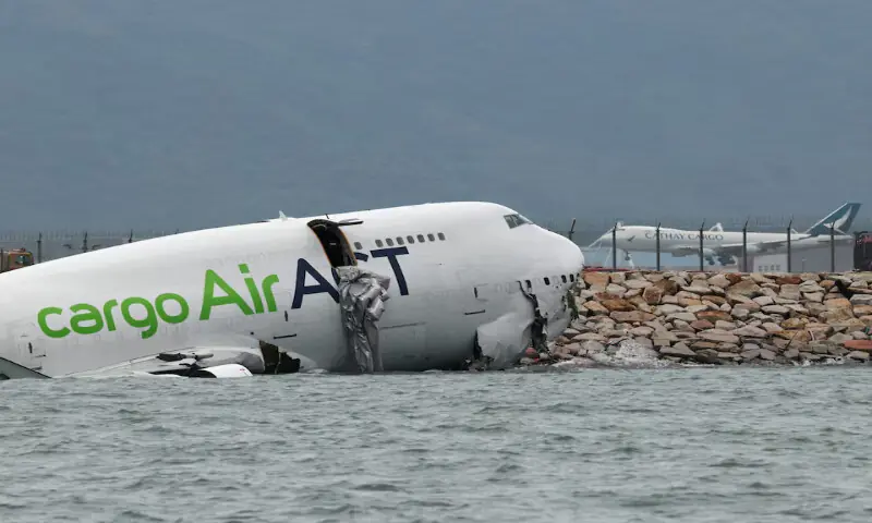 A cargo plane lies partially in the sea after veering off the runway during landing at Hong Kong International Airport in Hong Kong, China, on Monday. – Reuters A cargo plane lies partially in the sea after veering off the runway during landing at Hong Kong International Airport in Hong Kong, China, on Monday. – Reuters