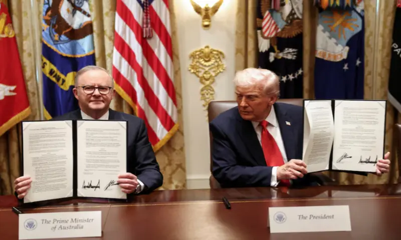 US President Donald Trump and Australia’s Prime Minister Anthony Albanese hold a signed agreement on rare earth and critical minerals during a meeting with in the Cabinet Room at the White House, in Washington, D.C., on October 20, 2025. Reuters