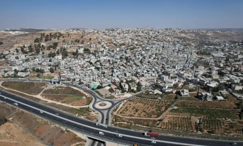 A drone view of Al-Arroub refugee camp alongside a new road, part of the expansion of Israeli bypass roads connecting Israeli settlers in the West Bank with Jerusalem, in the Israeli-occupied West Bank, on September 29, 2025. Reuters file A drone view of Al-Arroub refugee camp alongside a new road, part of the expansion of Israeli bypass roads connecting Israeli settlers in the West Bank with Jerusalem, in the Israeli-occupied West Bank, on September 29, 2025. Reuters file