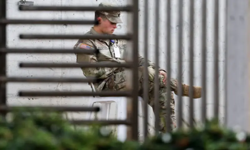 A US military member sits outside the Civil-Military Coordination Centre, on the day of a visit from US Secretary of State Marco Rubio, in Kiryat Gat, southern Israel, on October 24, 2025. Reuters