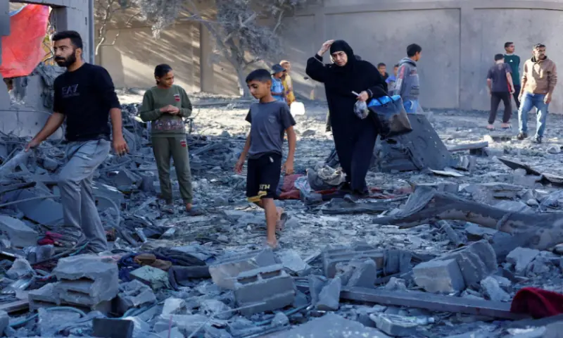 Palestinians inspect the site of an overnight Israeli strike on a house in Nuseirat, central Gaza Strip, on October 29, 2025. Reuters Palestinians inspect the site of an overnight Israeli strike on a house in Nuseirat, central Gaza Strip, on October 29, 2025. Reuters