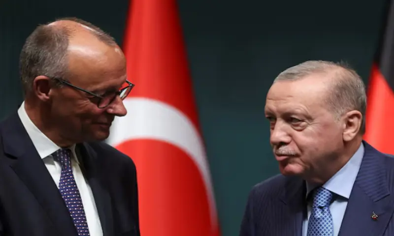 Turkish President Tayyip Erdogan and German Chancellor Friedrich Merz shake hands as they attend a press conference at the Presidential Palace in Ankara on October 30, 2025. Turkish President Tayyip Erdogan and German Chancellor Friedrich Merz shake hands as they attend a press conference at the Presidential Palace in Ankara on October 30, 2025.