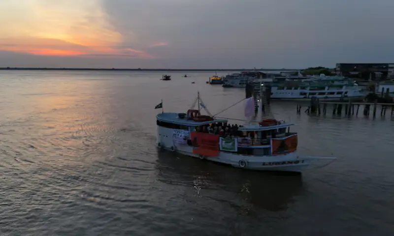 A drone view shows a boat, carrying Indigenous representatives from across Latin America, arriving in Belem, ahead of the UN Climate Change Conference (COP30), in Brazil. – Reuters
