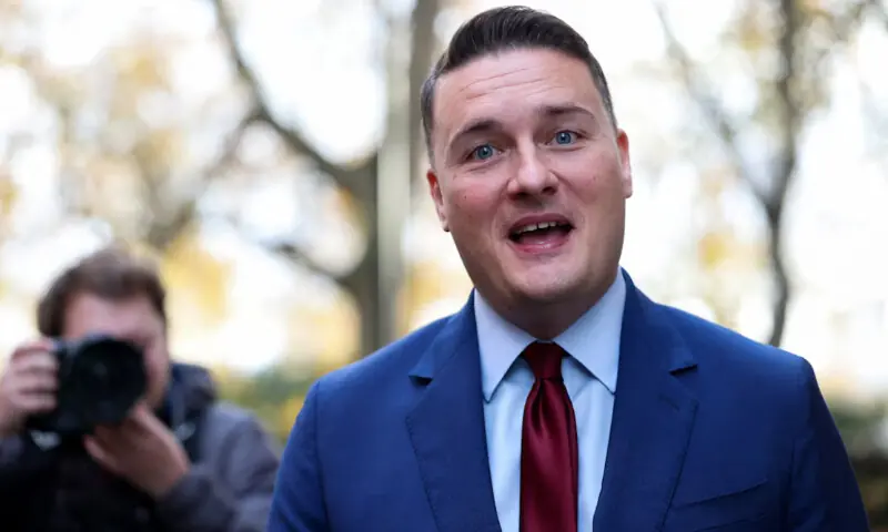 British Health Secretary Wes Streeting speaks to the media as he walks outside a television studio in London, Britain, November 12, 2025//REUTERS
