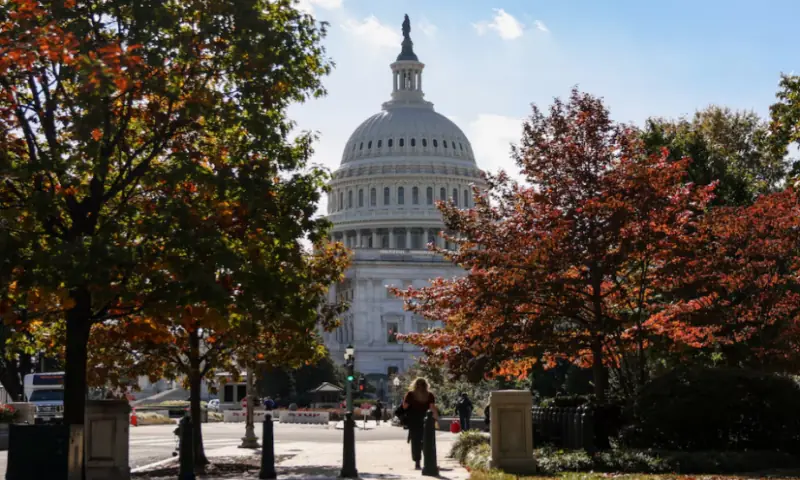 The US Capitol building is framed between trees with fall foliage, weeks into the continuing US government shutdown, in Washington, DC, on October 27, 2025. Reuters The US Capitol building is framed between trees with fall foliage, weeks into the continuing US government shutdown, in Washington, DC, on October 27, 2025. Reuters