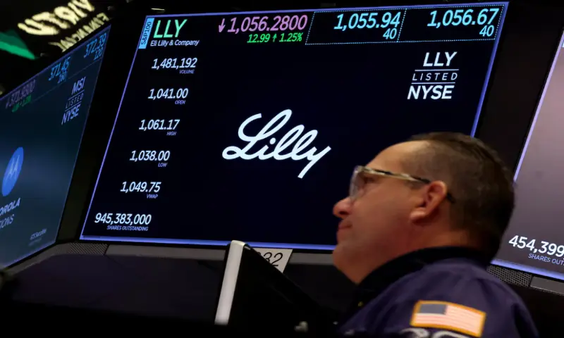 A screen displays the logo and trading information for Eli Lilly and Company on the floor at the New York Stock Exchange (NYSE) in New York City, US, November 21, 2025//REUTERS