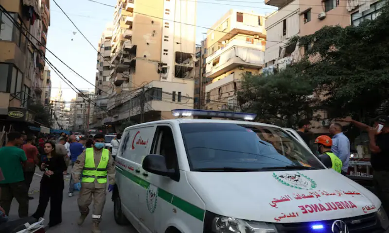 An ambulance vehicle stands near the site of an Israeli strike on a building in Beirut’s southern suburbs on Sunday. – Reuters