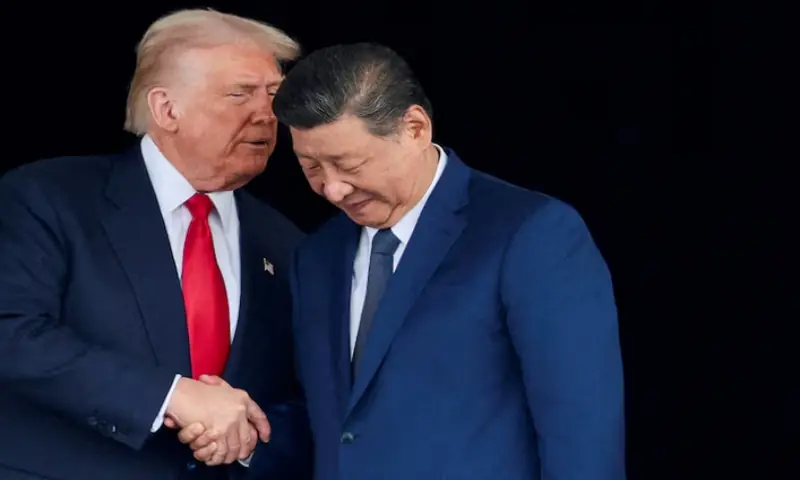 US President Donald Trump and Chinese President Xi Jinping talk as they leave after a bilateral meeting at Gimhae International Airport, on the sidelines of the Asia-Pacific Economic Cooperation (APEC) summit, in Busan, South Korea, October 30, 2025//REUTERS