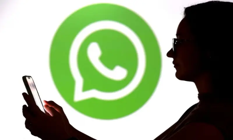 A teenager poses for a photo while holding a smartphone in front of a Whatsapp logo in this illustration taken September 11, 2025. Reuters file A teenager poses for a photo while holding a smartphone in front of a Whatsapp logo in this illustration taken September 11, 2025. Reuters file