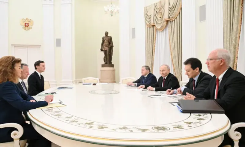 Russian President Vladimir Putin, presidential envoy Kirill Dmitriev and foreign policy aide Yuri Ushakov attend a meeting with U.S. President Donald Trump’s special envoy Steve Witkoff and son-in-law Jared Kushner at the Kremlin in Moscow, Russia, on December 2, 2025. Sputnik/Reuters