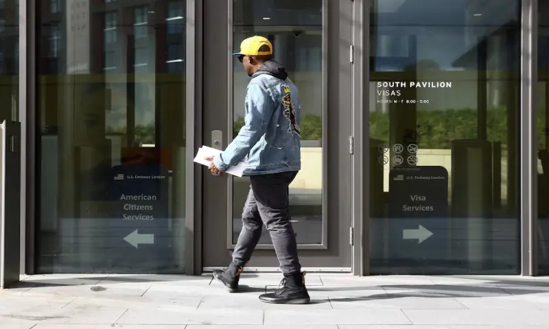A visitor tries to enter the visa section of the U.S. Embassy in Nine Elms in London, Britain, May 1, 2018. — Reuters