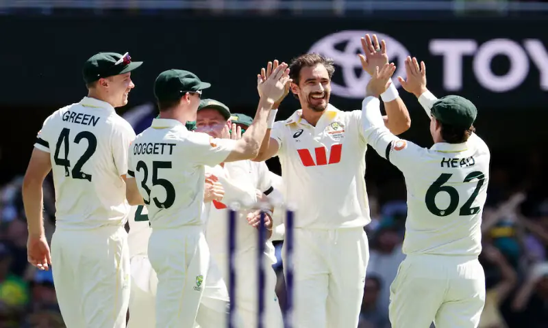 [2/7] Cricket - The Ashes - Australia v England - Second Test - The Gabba, Brisbane, Australia - December 4, 2025
Australia’s Mitchell Starc celebrates with teammates after taking the wicket of England’s Ben Duckett. – Reuters