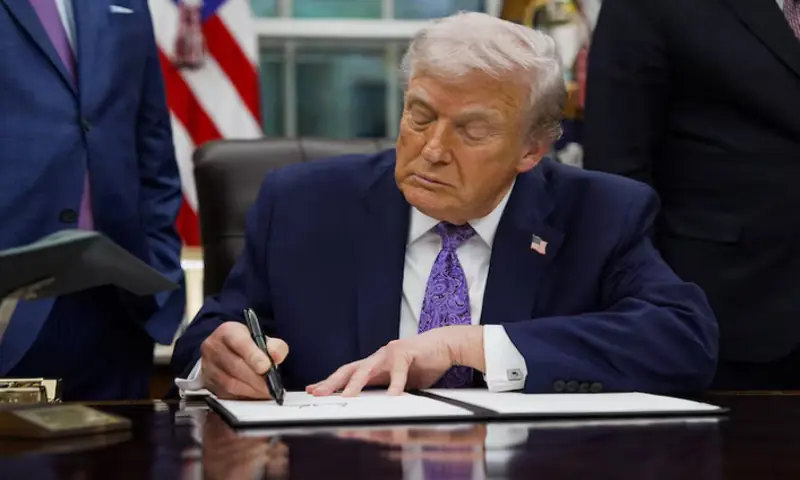 US President Donald Trump signs an executive order on AI, in the Oval Office at the White House in Washington, DC, US, December 11, 2025. —Reuters US President Donald Trump signs an executive order on AI, in the Oval Office at the White House in Washington, DC, US, December 11, 2025. —Reuters