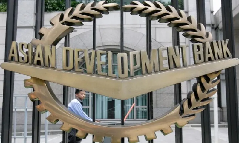 A worker walks past inside the Asian Development Bank headquarters in Manila on June 17, 2009. Reuters file A worker walks past inside the Asian Development Bank headquarters in Manila on June 17, 2009. Reuters file