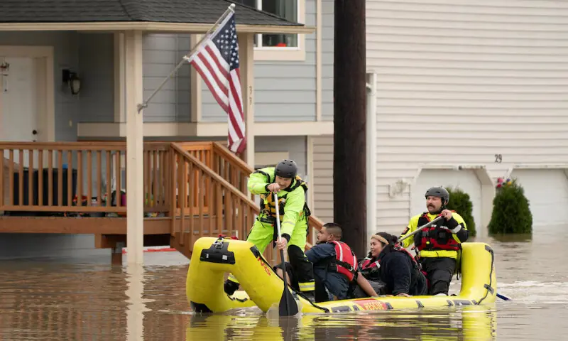 Rescue personnel evacuate Miguel Martinez and his sister Epifani Martinez, who were stranded in their home in an area flooded by the Snohomish River in Washington. – Reuters Rescue personnel evacuate Miguel Martinez and his sister Epifani Martinez, who were stranded in their home in an area flooded by the Snohomish River in Washington. – Reuters