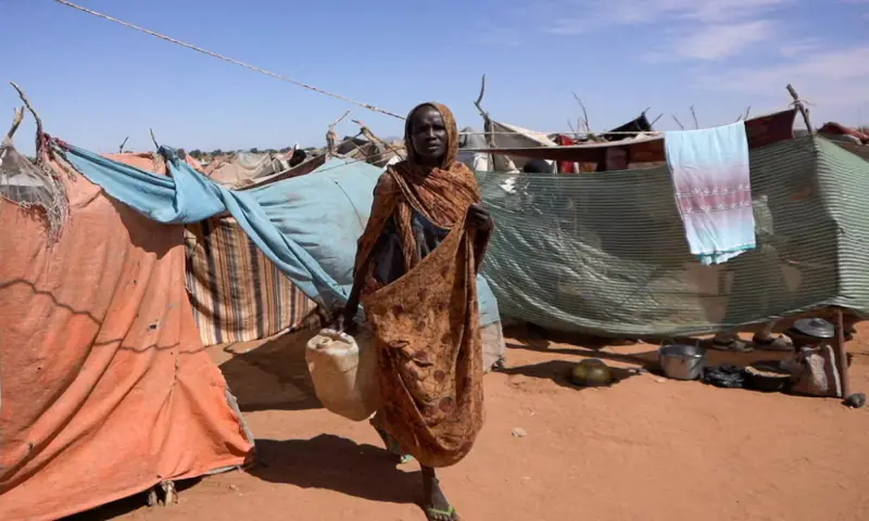 Awadeya, a Sudanese displaced woman who was held by the paramilitary Rapid Support Forces (RSF), carries a water container at a camp for displaced people who fled from al-Fashir to Tawila, North Darfur, Sudan. – Reuters Awadeya, a Sudanese displaced woman who was held by the paramilitary Rapid Support Forces (RSF), carries a water container at a camp for displaced people who fled from al-Fashir to Tawila, North Darfur, Sudan. – Reuters
