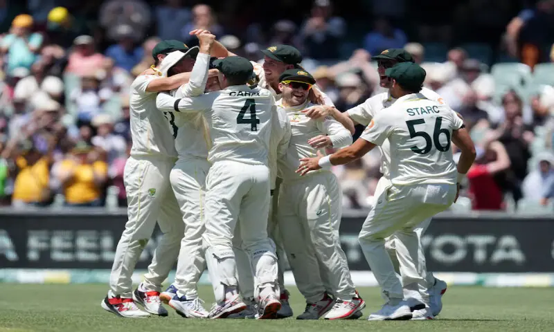 Australian players celebrate winning the third Ashes Test match in Adelaide. &ndash; Reuters