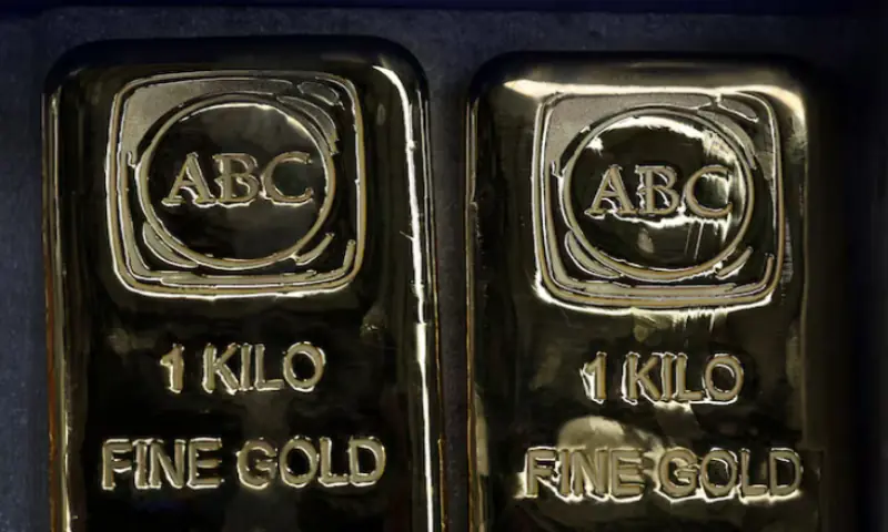 One-kilogram gold bullion bars lie on a surface at ABC Refinery in Sydney, Australia. &ndash; Reuters